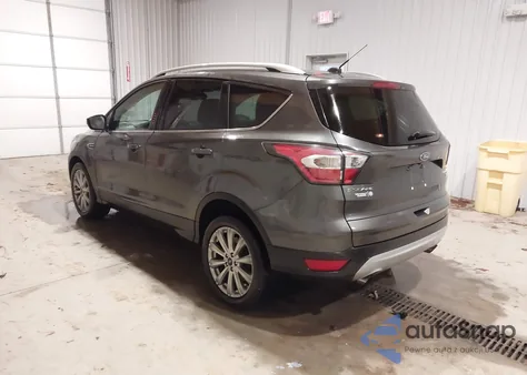 2017 Ford Escape Titanium z USA, uszkodzony, nr VIN 1FMCU0J97HUB46118